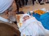 اذان آیت‌الله اعرافی در گوش نوزاد پس از نماز عید قربان