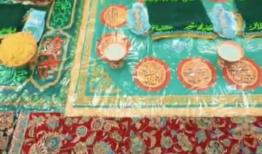 مراسم معنوی بسته بندی نبات و نمک متبرک توسط خادمان رضوی