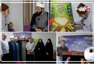 پوستر«هماوری قرآنی آلاء ۲» در منزل شهید علیزاده رونمایی شد