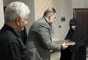 تجلیل مجمع خیرین سلامت قم از خانواده شهید دکتر داوود شیروانی