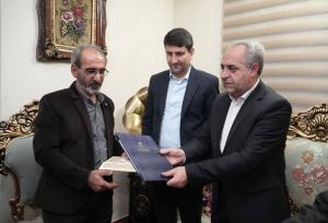 دیدار وزیر ارتباطات با خانواده شهید اقتدار