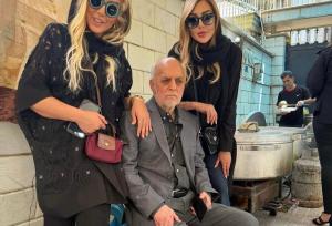 عکسی از محمود خوردبین و دخترانش پای دیگ نذری