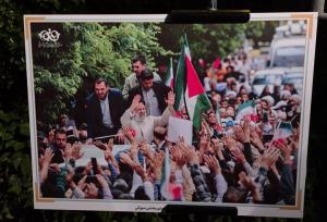 نمایشگاه عکس «رئیس‌جمهور شهید» در قم برپا شد