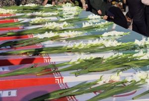 ورود پیکر مطهر ۱۳ شهید گمنام دفاع مقدس به مشهد مقدس