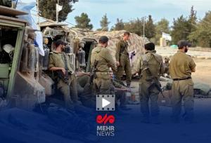 نظامیان صهیونیست در حال دزدی از باغ زیتون فلسطینی‌ها