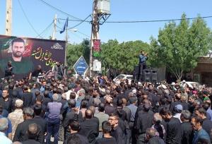 شهید حسن احمدی در زاوه تشییع شد