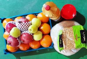 توزیع بیش از هزار بسته‌ یلدایی رضوی میان خانواده‌های کم‌بضاعت فارس