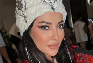 لیلا اوتادی کنار جواد افشار در پشت‌صحنه «گاندو»