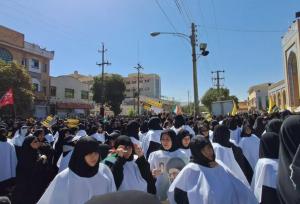 کفن پوشی بانوان در اجتماع کرمانشاهیان برای شهادت سید حسن نصرالله