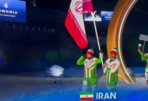 لحظات احساسی و اشک‌های پرچمدار بانوی ایرانی در مراسم رژه