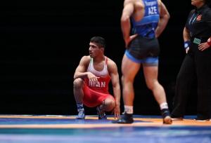 مومنی به مدال برنز رسید