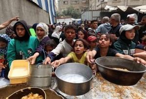 تیراندازی نظامیان صهیونیست به صفوف توزیع کمک‌های انسانی در غزه