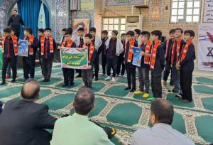 اجرای سرود دانش آموزی در مراسم ۱۳ آبان گناوه