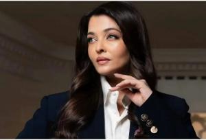 آیشواریای زیبا در کنار خانواده باچان