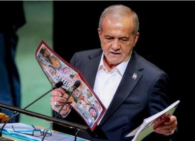 نمایش عکس شهدای زن و کودک ایرانی توسط پزشکیان 