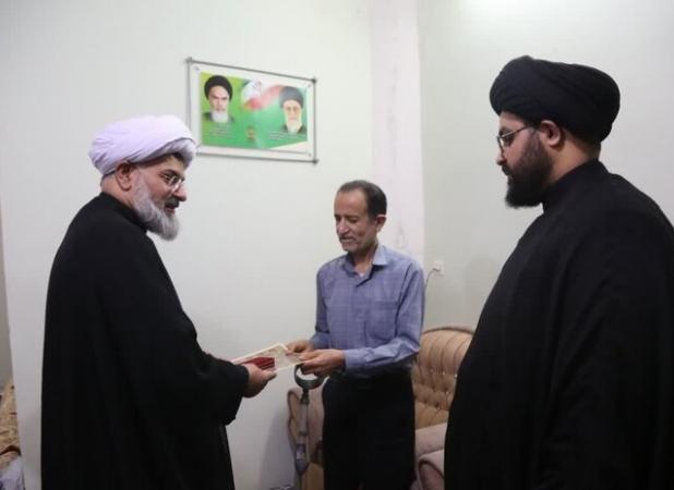 دیدار امام جمعه دشتی با جانباز دفاع مقدس