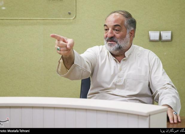 نریمان پناهی: پرچم امام حسین، کشور ما را از جنگها حفظ کرده است