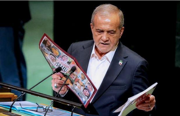 نمایش عکس شهدای زن و کودک ایرانی توسط پزشکیان 