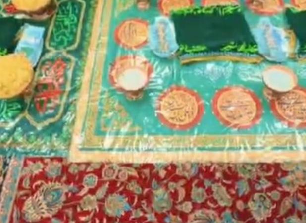 مراسم معنوی بسته بندی نبات و نمک متبرک توسط خادمان رضوی