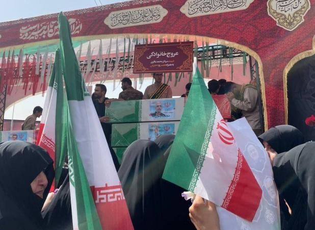 تابوت سردار شهید باقری به همراه همسر و دخترش