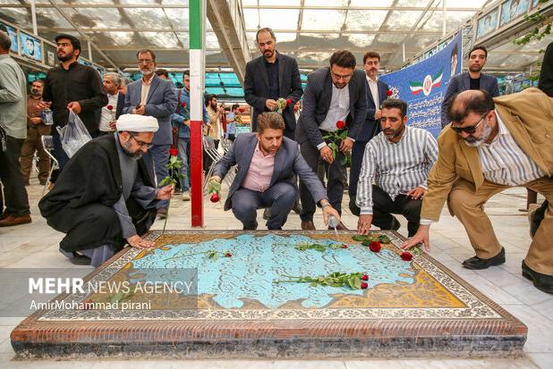 آیین غبارروبی مزار شهدا با حضور اصحاب رسانه در قم برگزار شد