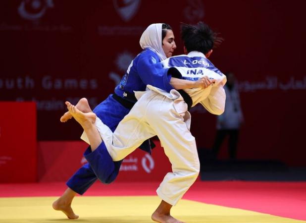 مدال طلای جودو بر گردن دختر ایران