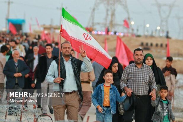 اهتزاز پرچم خدمت‌رسانی در شلمچه