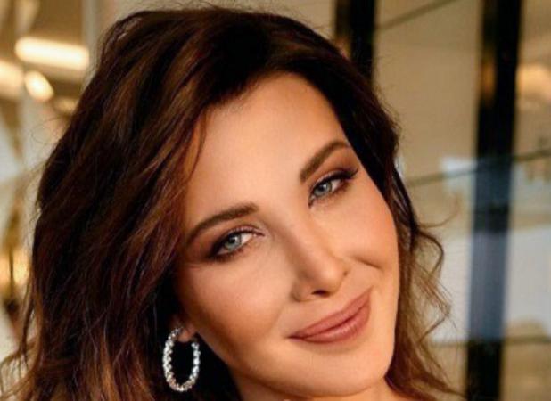 قاب عاشقانه نانسی عجرم و همسرش در دبی