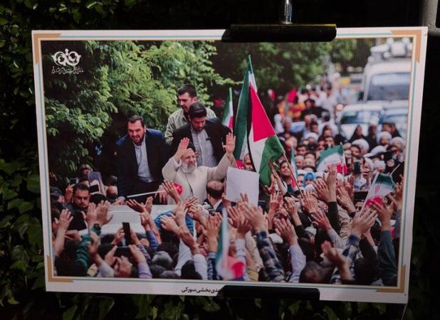 نمایشگاه عکس «رئیس‌جمهور شهید» در قم برپا شد