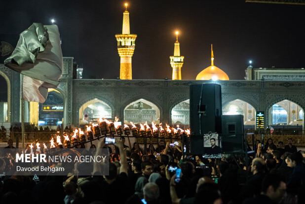 آیین مشعل گردانی شب تاسوعا در مشهد