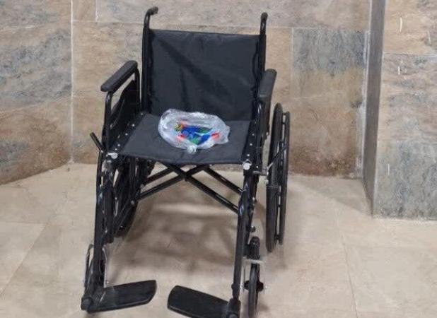 اهدا چهارمین ویلچر از محل جمع‌آوری درب بطری در بیجار