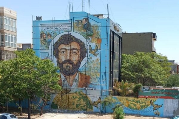 نقاشی دیواری شهید مجید حدادعادل در خیابان آزادی اجرا شد