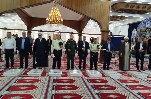 اهتزاز پرچم ایران و گلباران مزار شریف شهدای آستانه اشرفیه