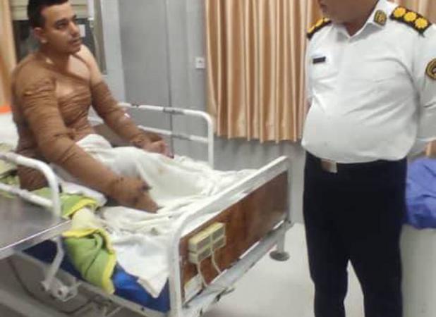 تصویر پلیسی که توسط یک راننده آتش زده شد