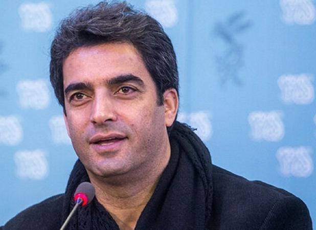 قابی از منوچهر هادی و کشتی‌گیر مشهور در تعزیه