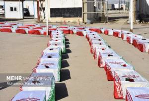 تصاویری دیگر از ورود پیکر ۸۵ شهید دفاع مقدس