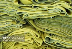 طاقه‌های پارچه قاچاق در آب های قشم کشف شد