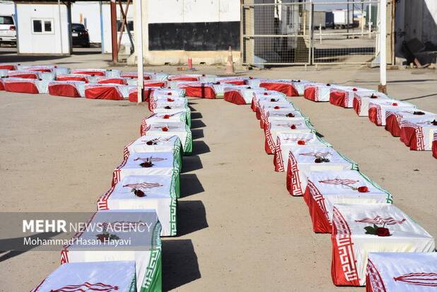 تصاویری دیگر از ورود پیکر ۸۵ شهید دفاع مقدس