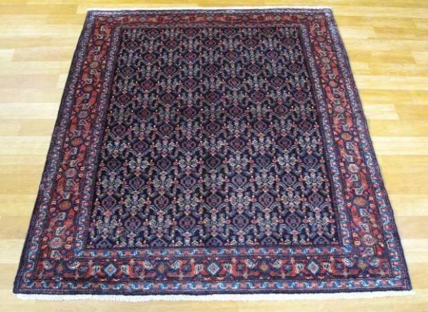 «ماهی درهم» نقشی که تاریخ را می‌بافد؛ راز کهن در تار و پود قالی کردی